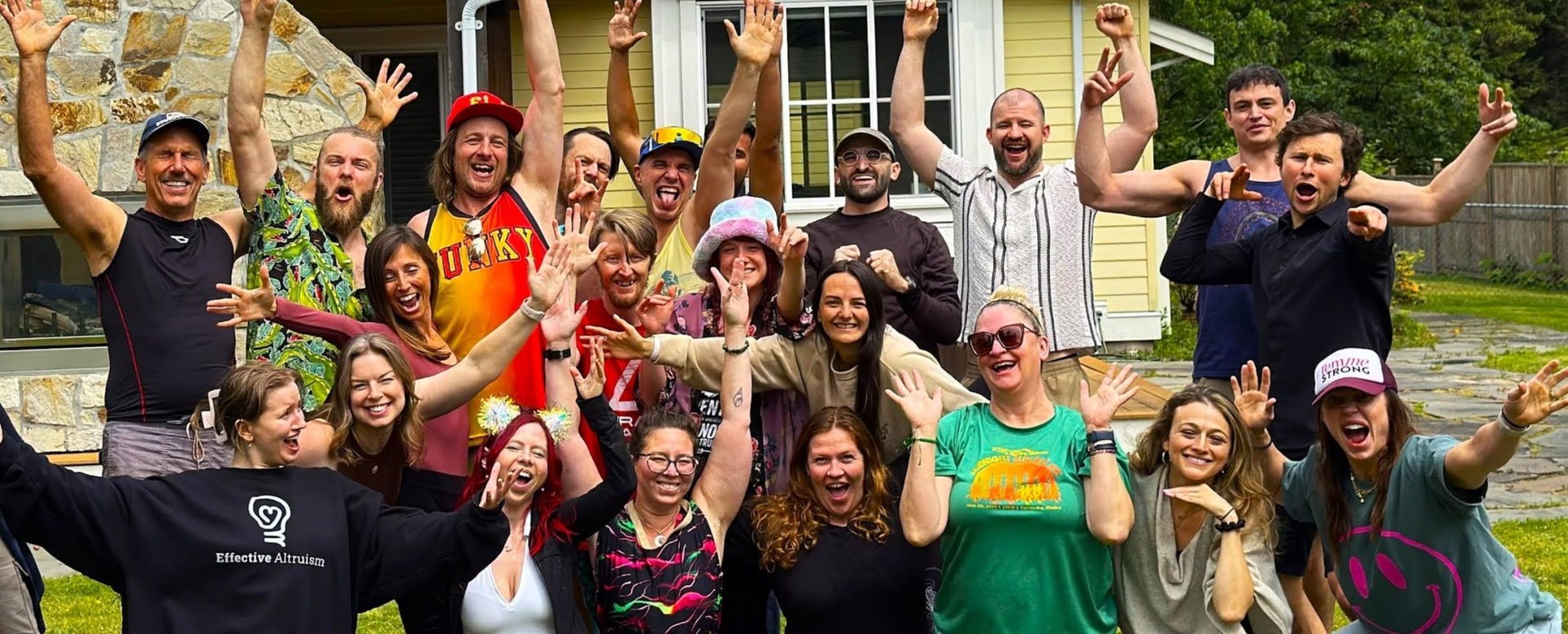 Group of Joymakers celebrating together outdoors